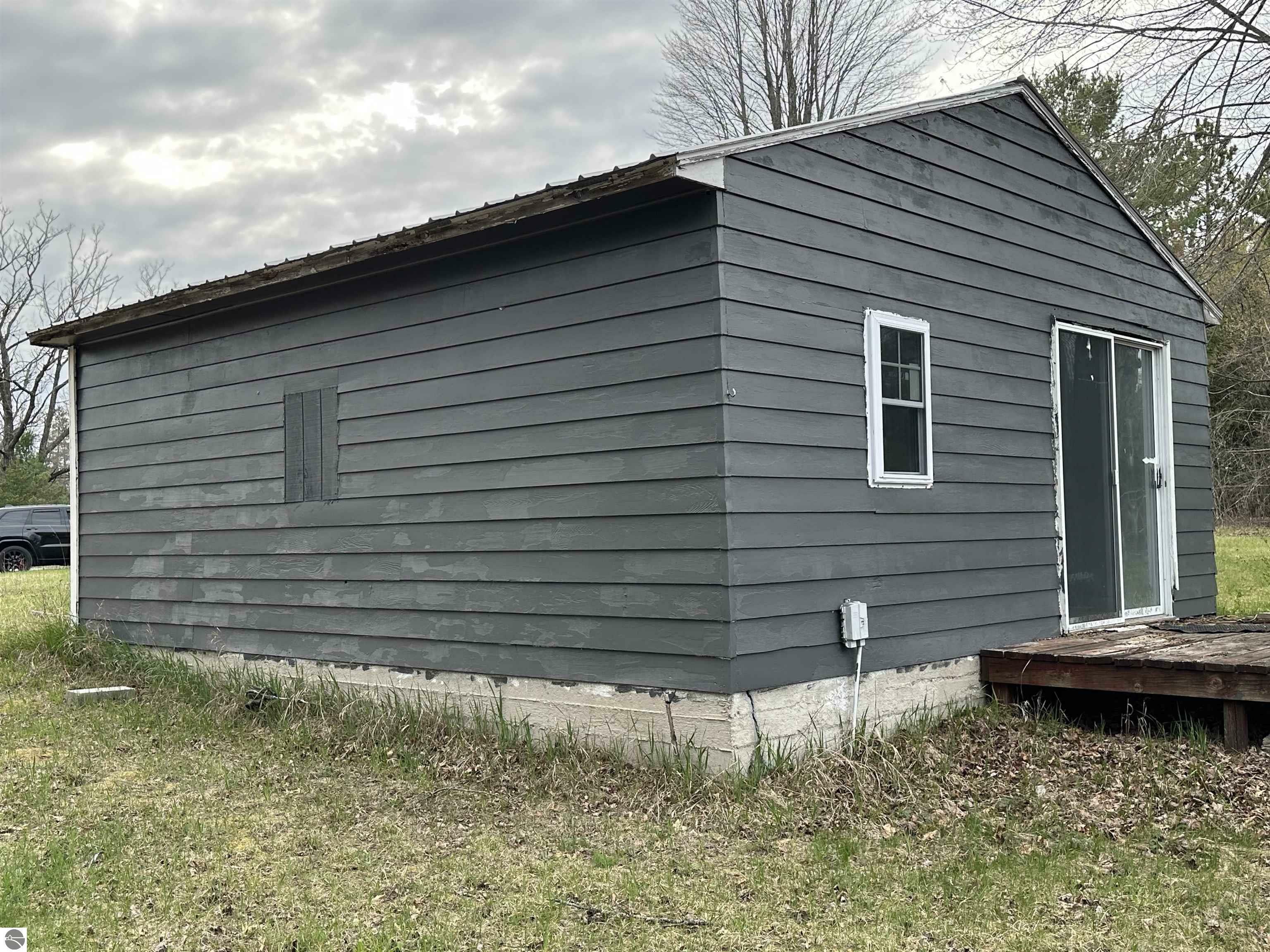 Property Photo:  13036 M-115  MI 49665 