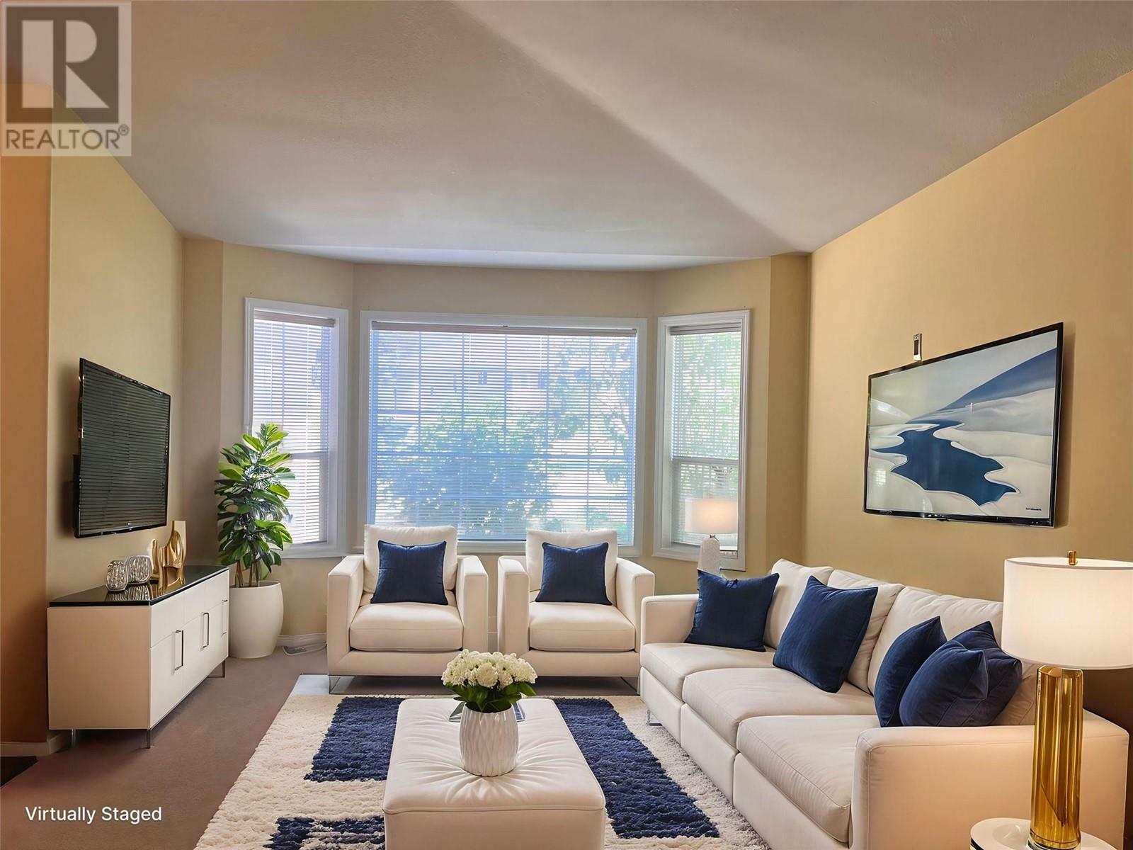 Property Photo: 2250 Louie Drive 103 BC V4T 2M6