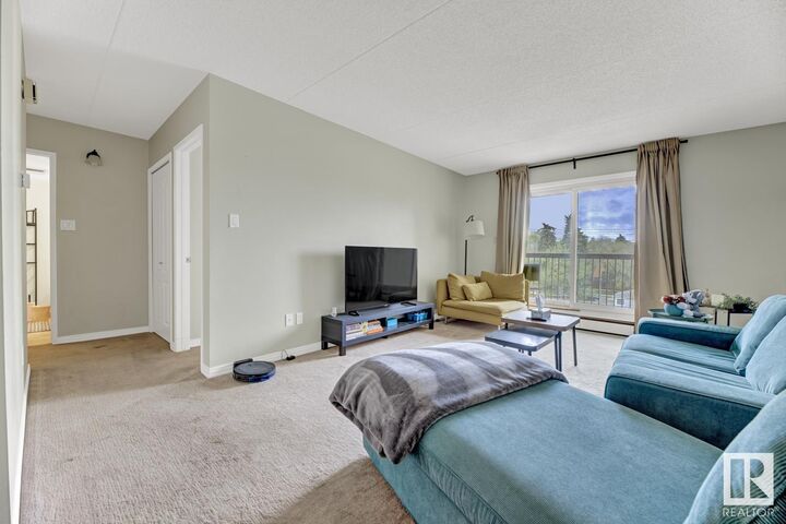 Property Photo:  11026 106 Street NW 404  AB T5H 2Y4 