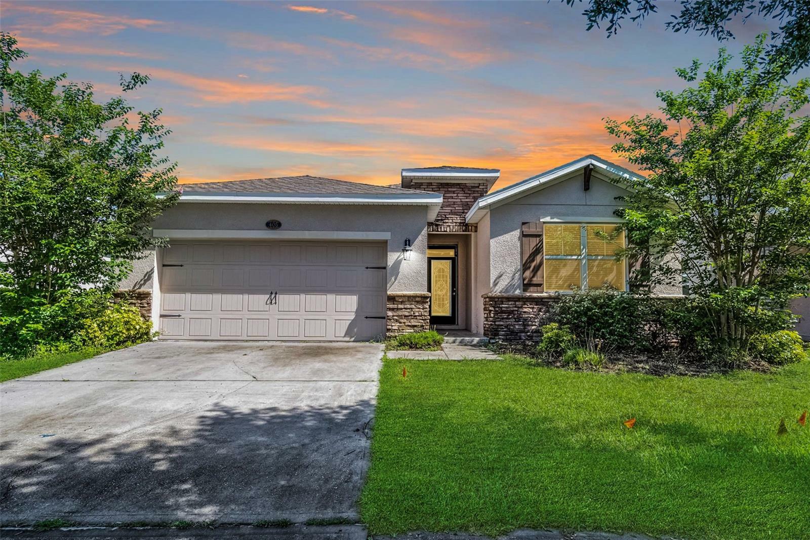 Property Photo: 405 E Freesia Court FL 32724