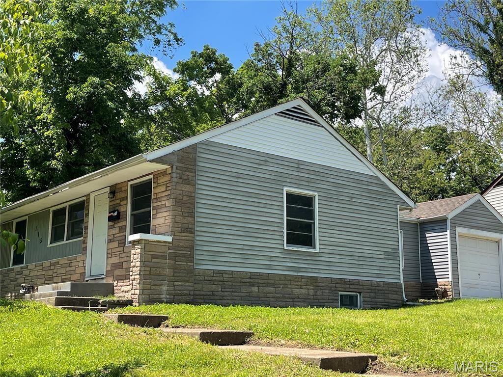 Property Photo: 115 Spring Garden Drive MO 63137