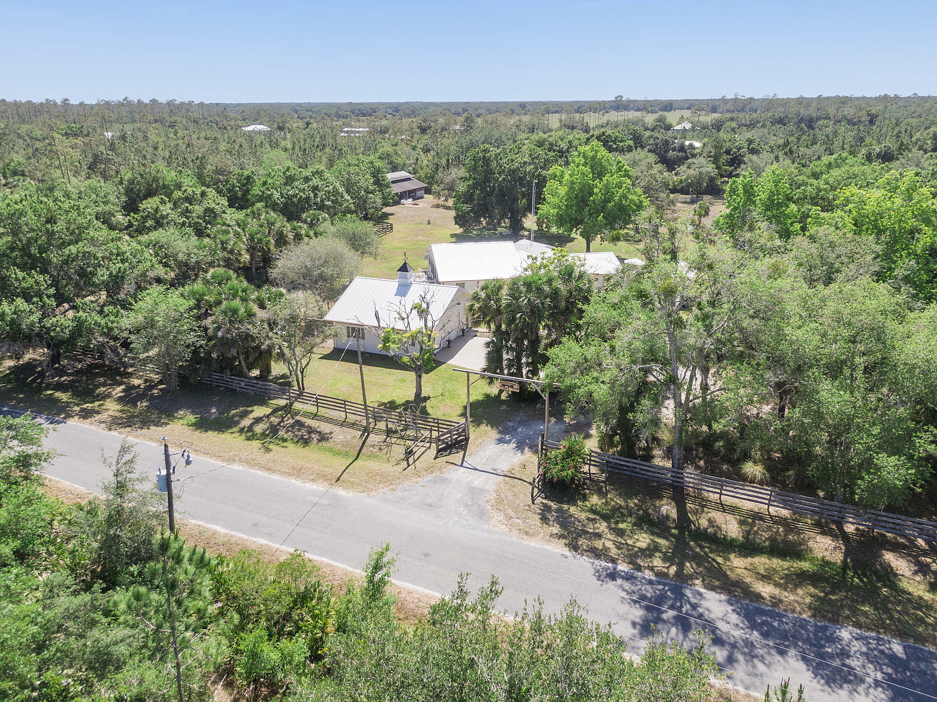 Property Photo: 32801 US Highway 441 N 64 FL 34972