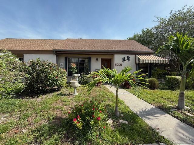 Property Photo: 5201 Spice Drive FL 33418