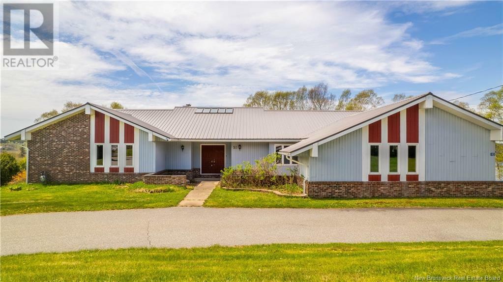 Property Photo: 53 Riverview Avenue NB E5C 3M5