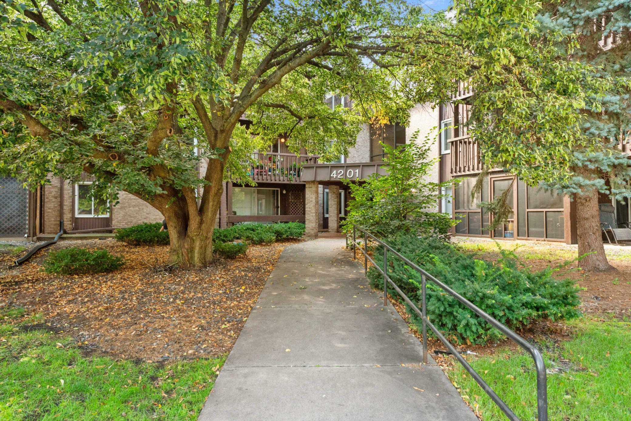 Property Photo: 4201 Lakeside Avenue N 317 MN 55429