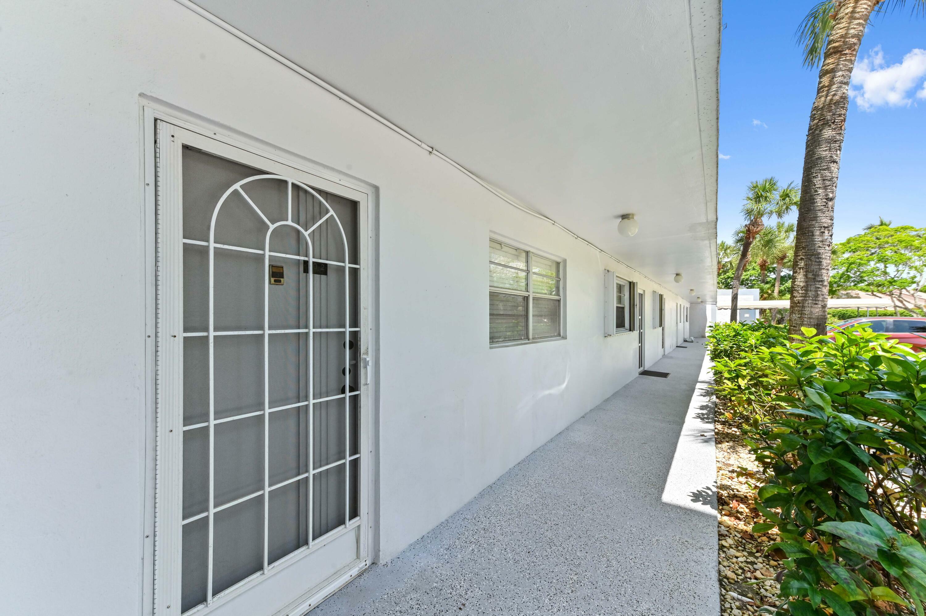 Property Photo:  198 NW 67th Street 102  FL 33487 