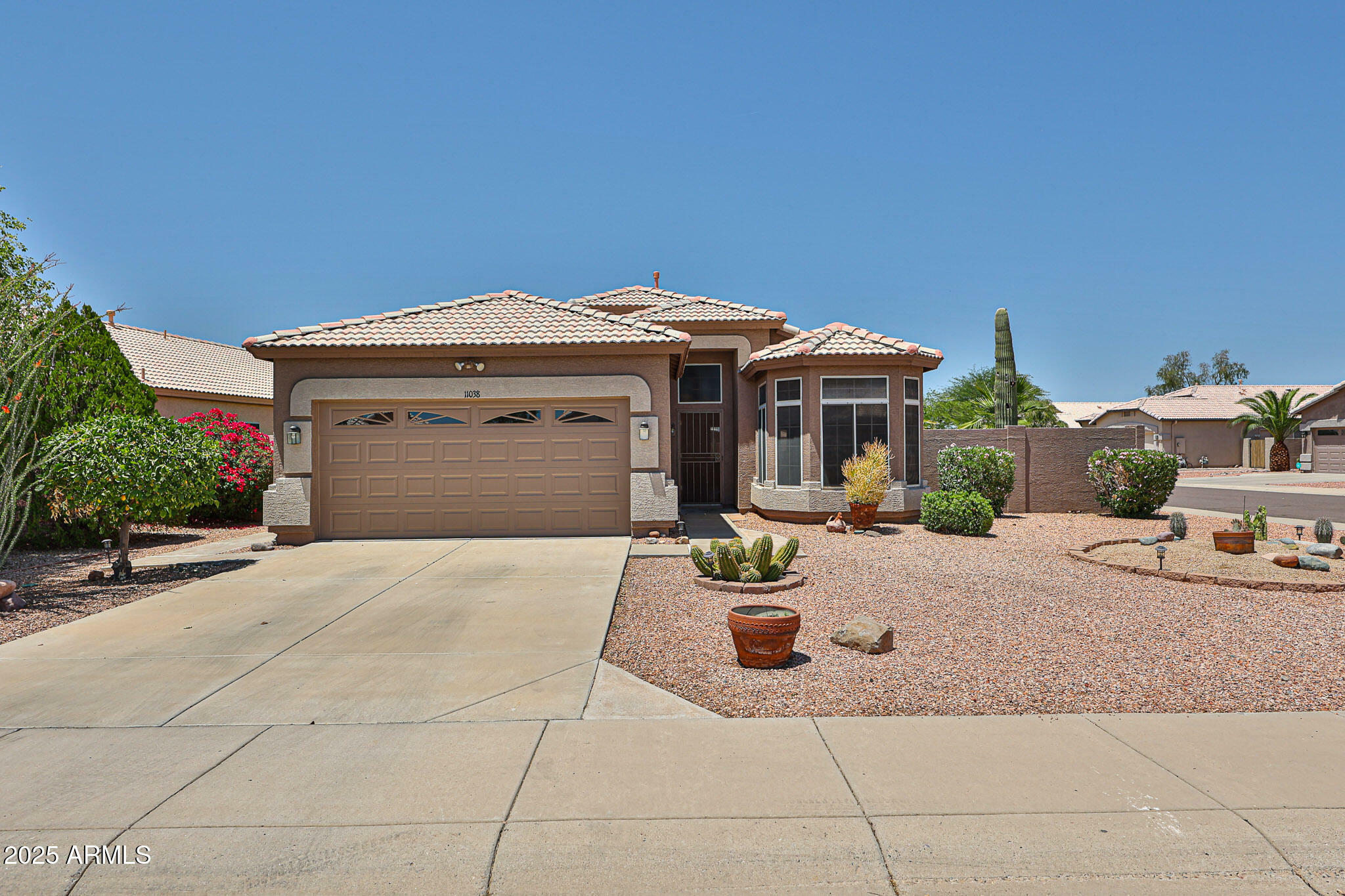 Property Photo: 11038 W Oraibi Drive AZ 85373