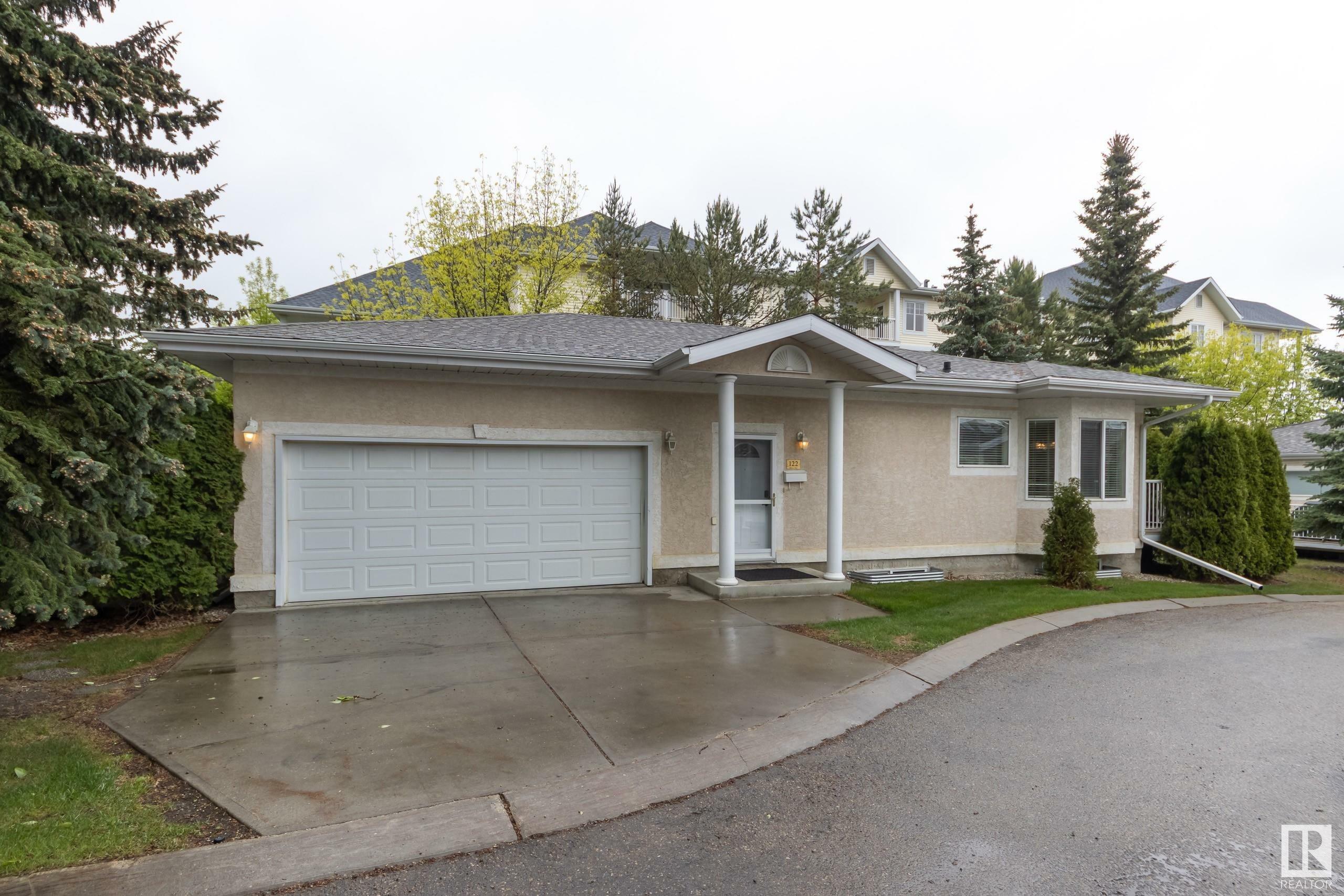 Property Photo:  122 Falconer Court NW  AB T6R 2V8 