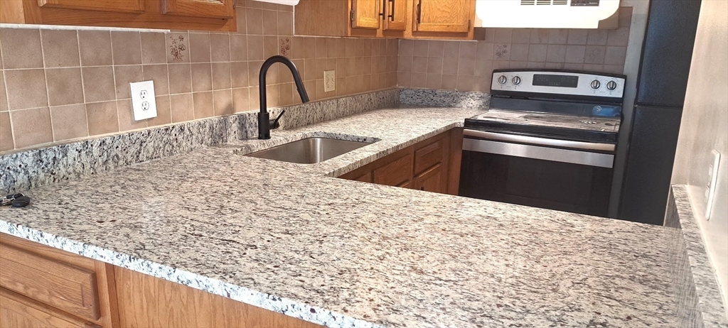 Property Photo:  616 Boston Post Rd E 17  MA 01752 