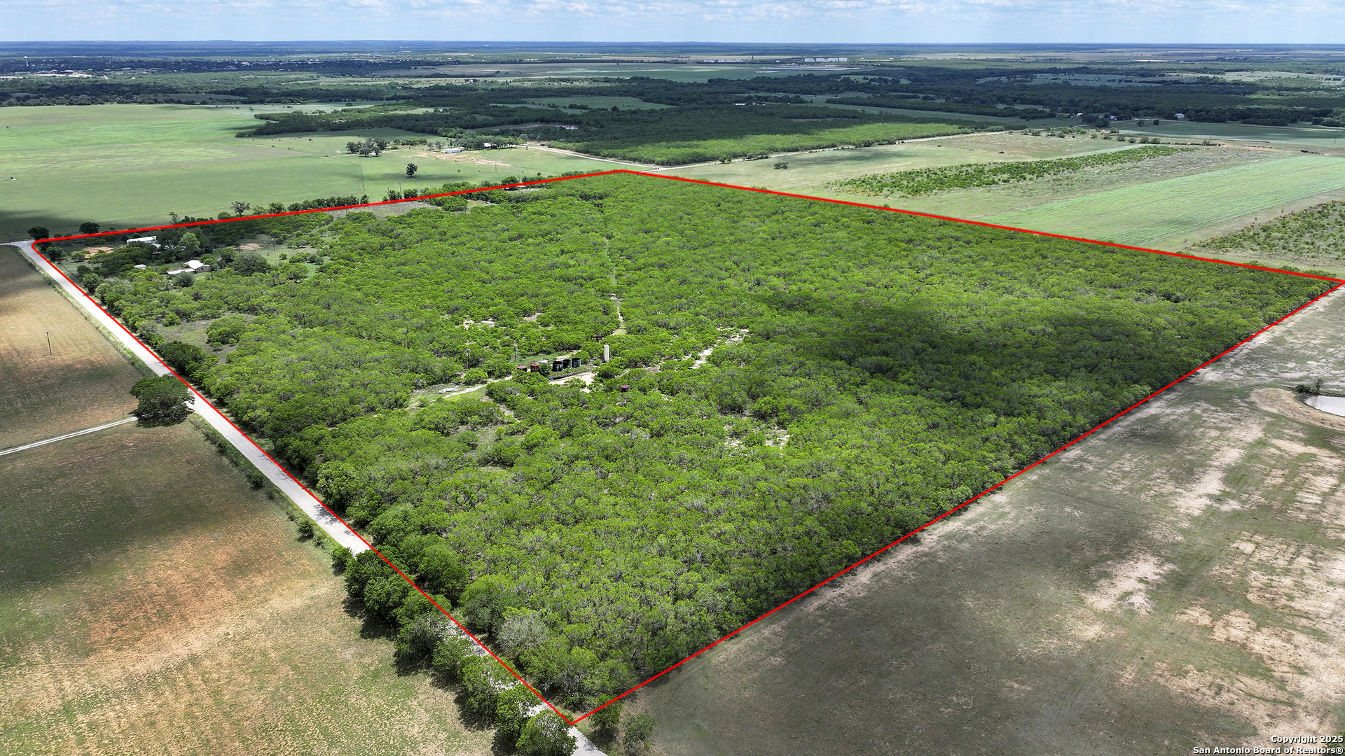 Property Photo: 1702 County Road 116 TX 78140