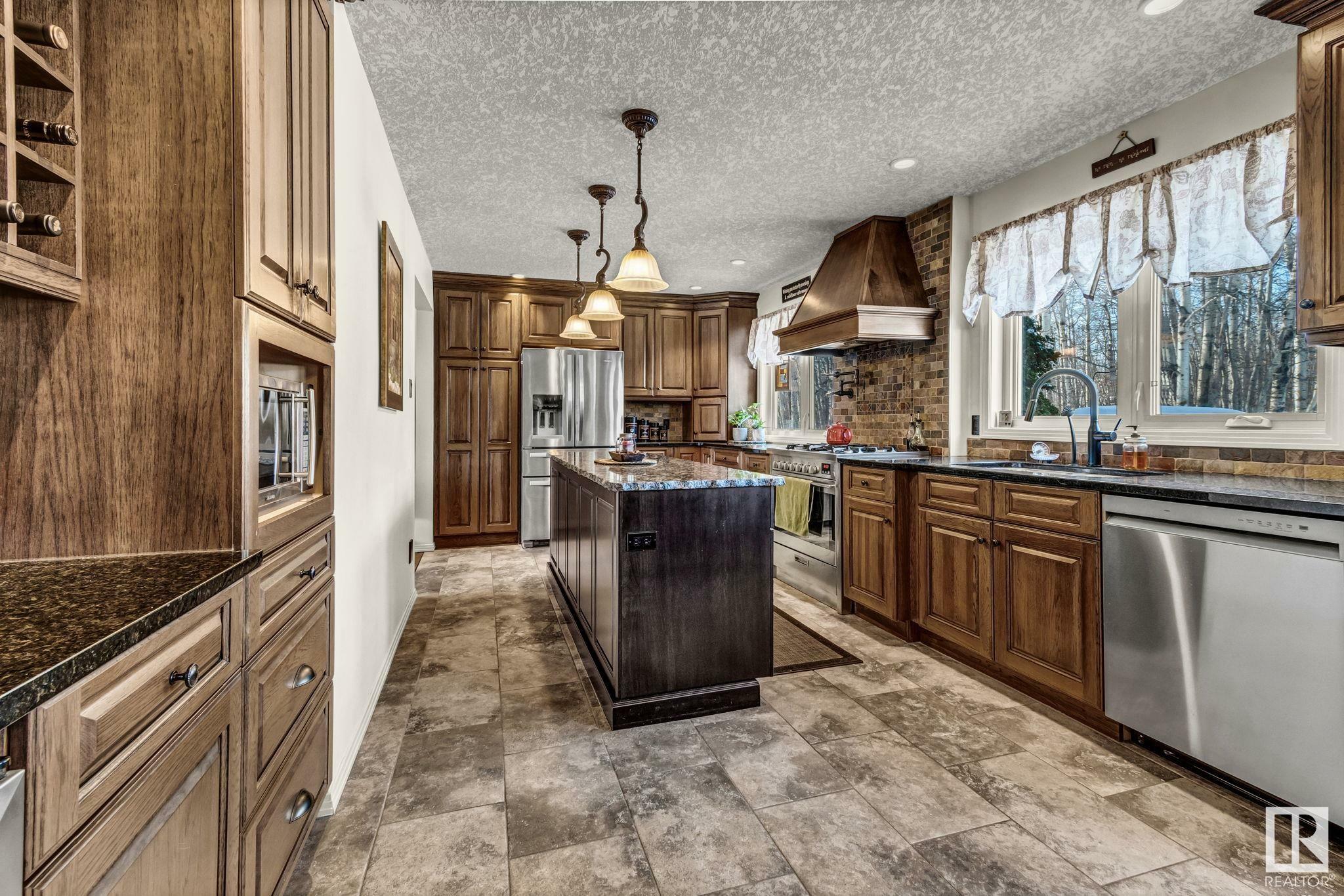Property Photo: 14-54006 Rge Rd 274 AB T7X 3S8