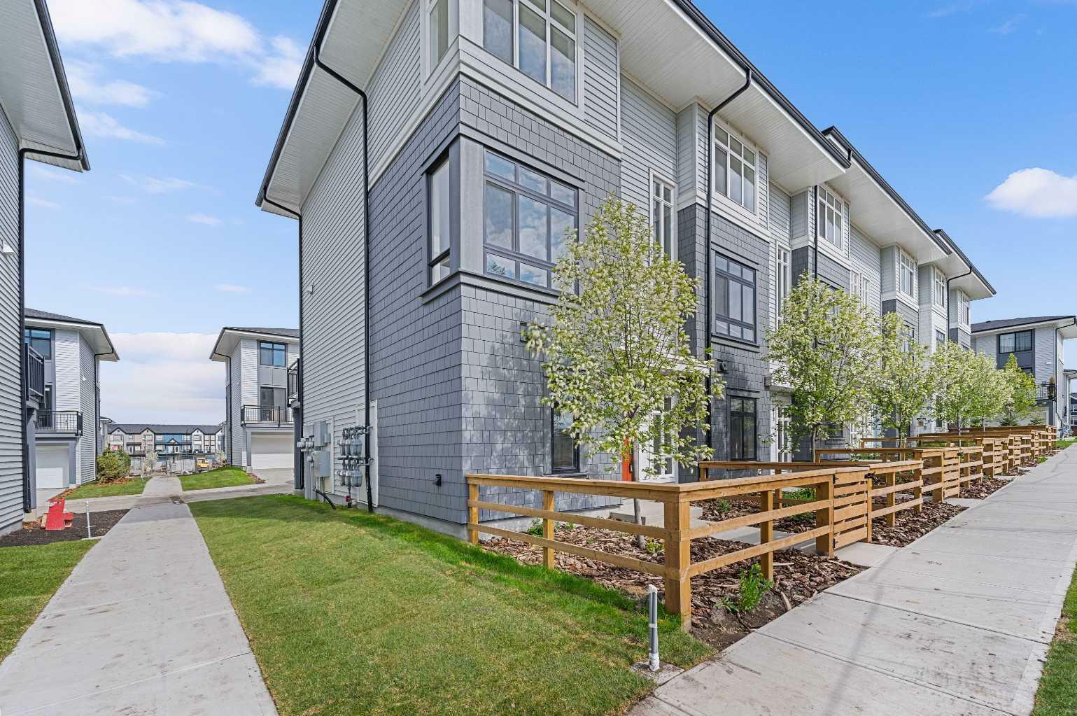 Property Photo: 857 Belmont Drive SW 317 AB T2X 4P2