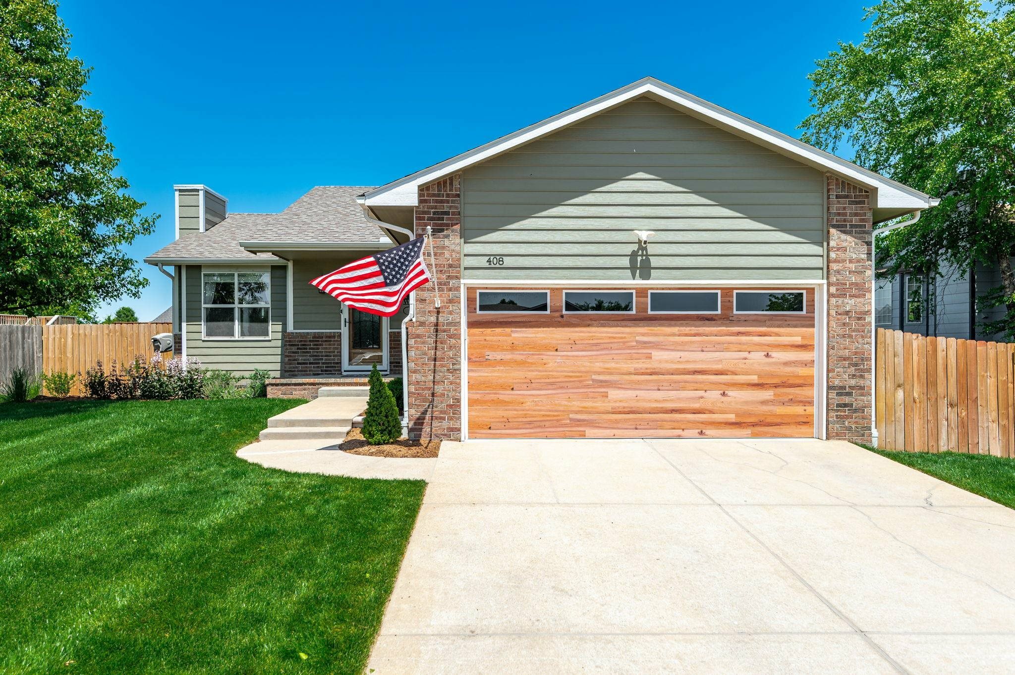 Property Photo: 408 E Woodfield Ave KS 67110