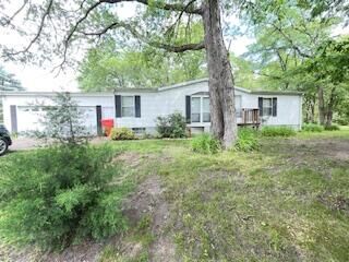 Property Photo:  10707 N State Road 55  IN 46310 