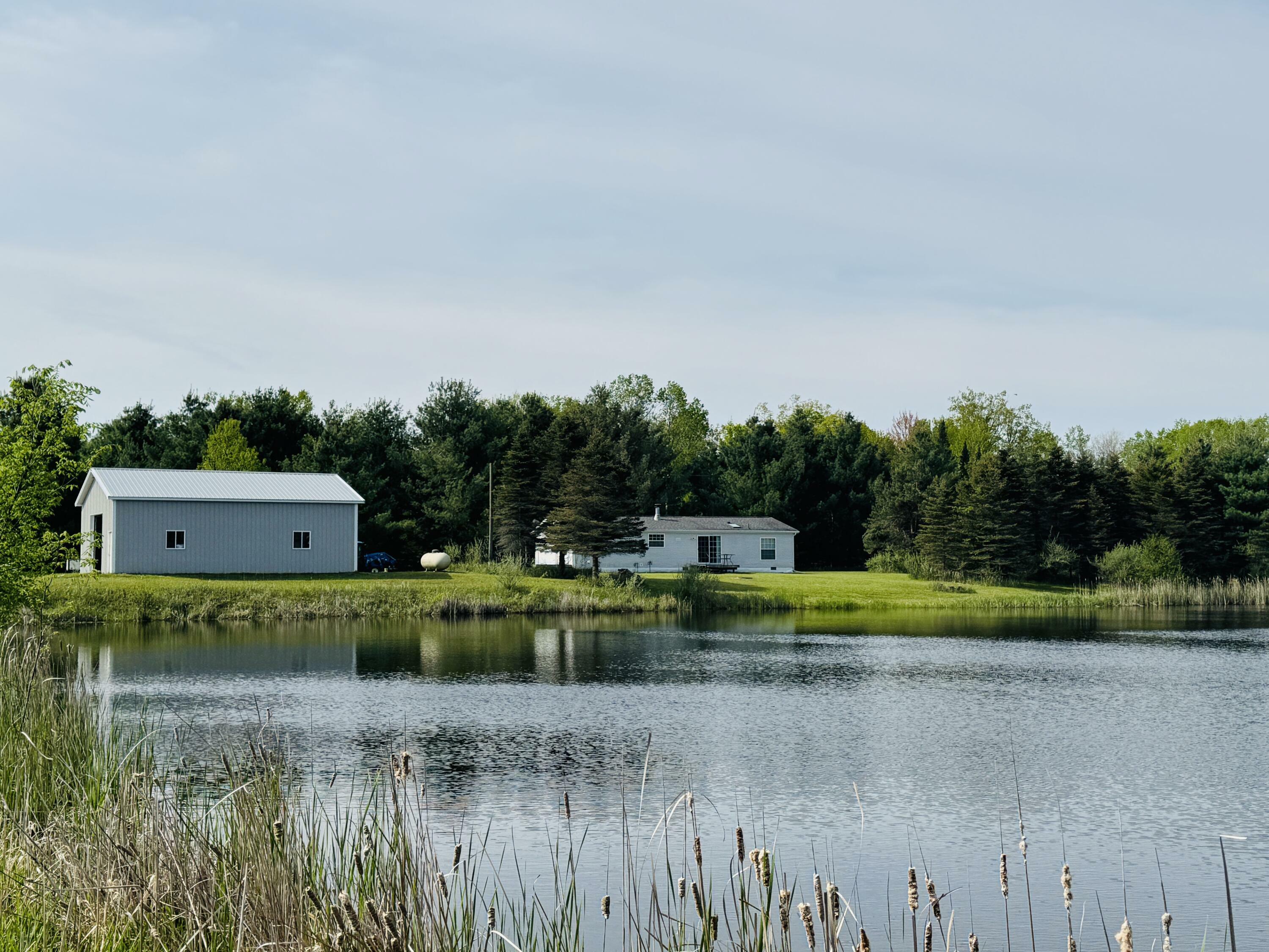 Property Photo:  1154 M-72 West  MI 48705 