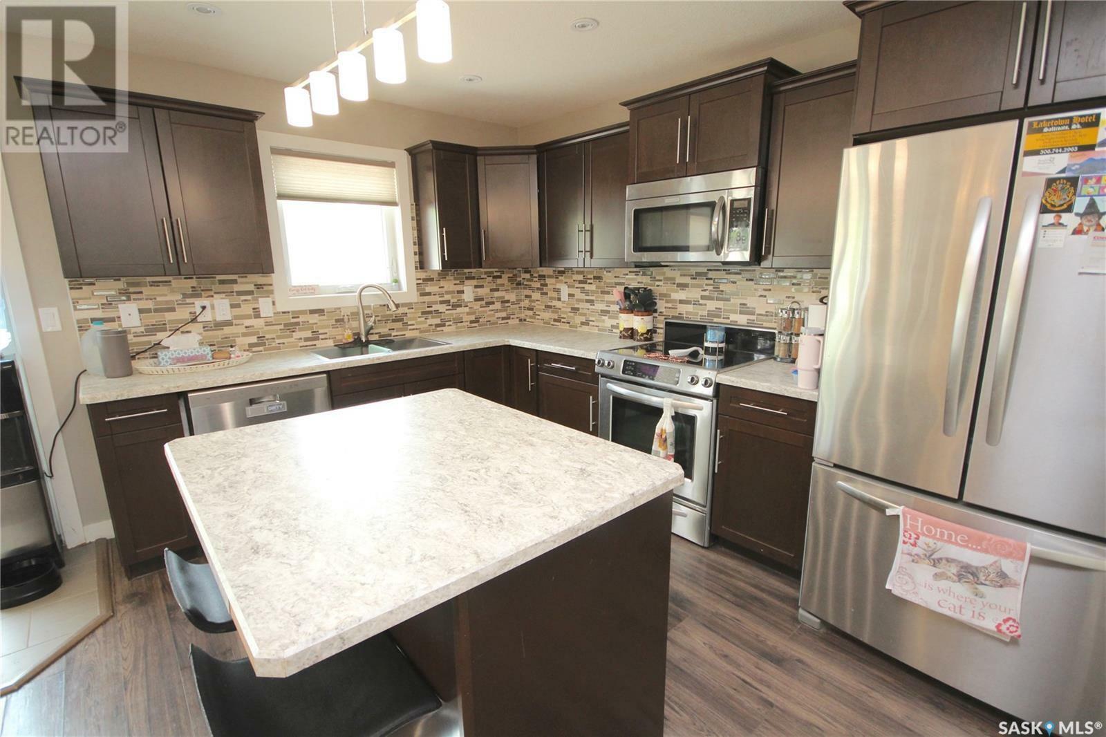 Property Photo: 127 5th Avenue N SK S3N 0Z3