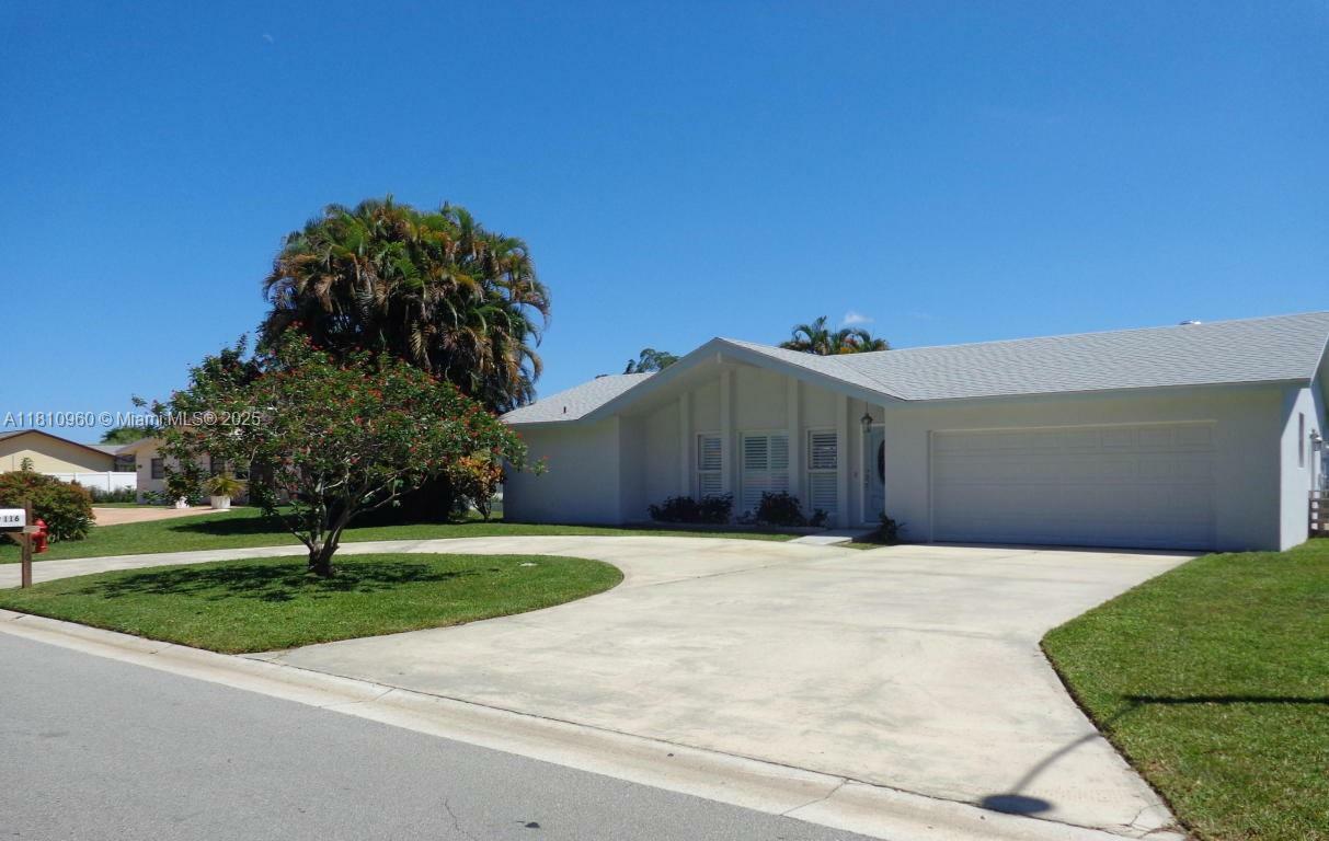 Property Photo:  116 Meadowlark Dr  FL 33411 