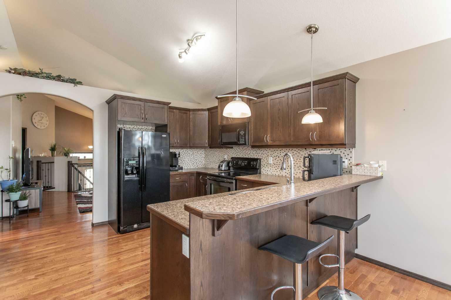 Property Photo: 56 Mackenzie Crescent AB T4S 1X6