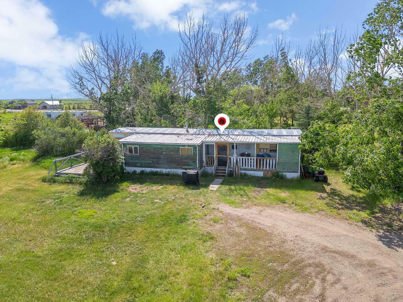 Property Photo:  254015 Township 240 Road  AB T1P 1J6 
