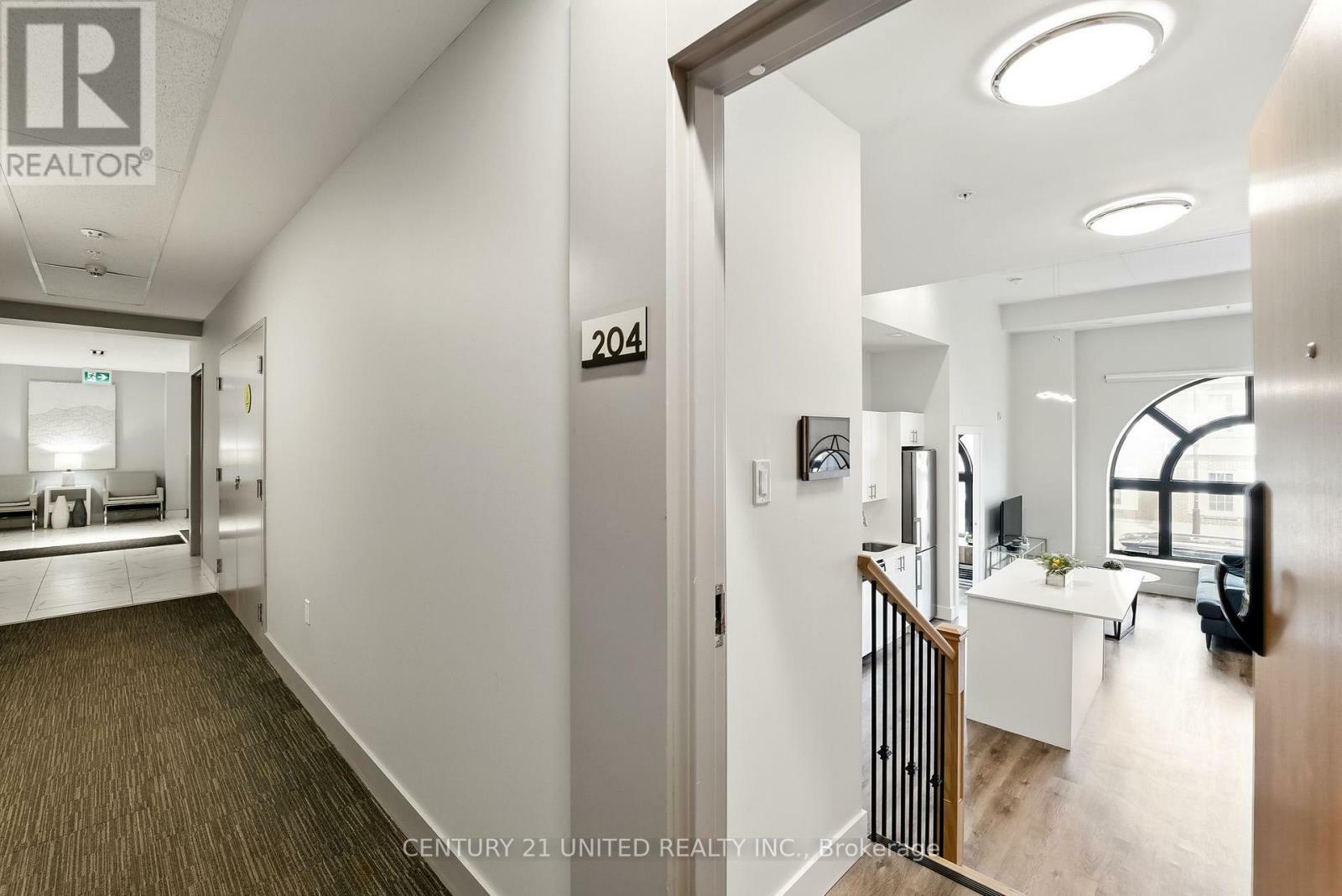 Property Photo:  475 George Street North 204  ON K9J 3G6 