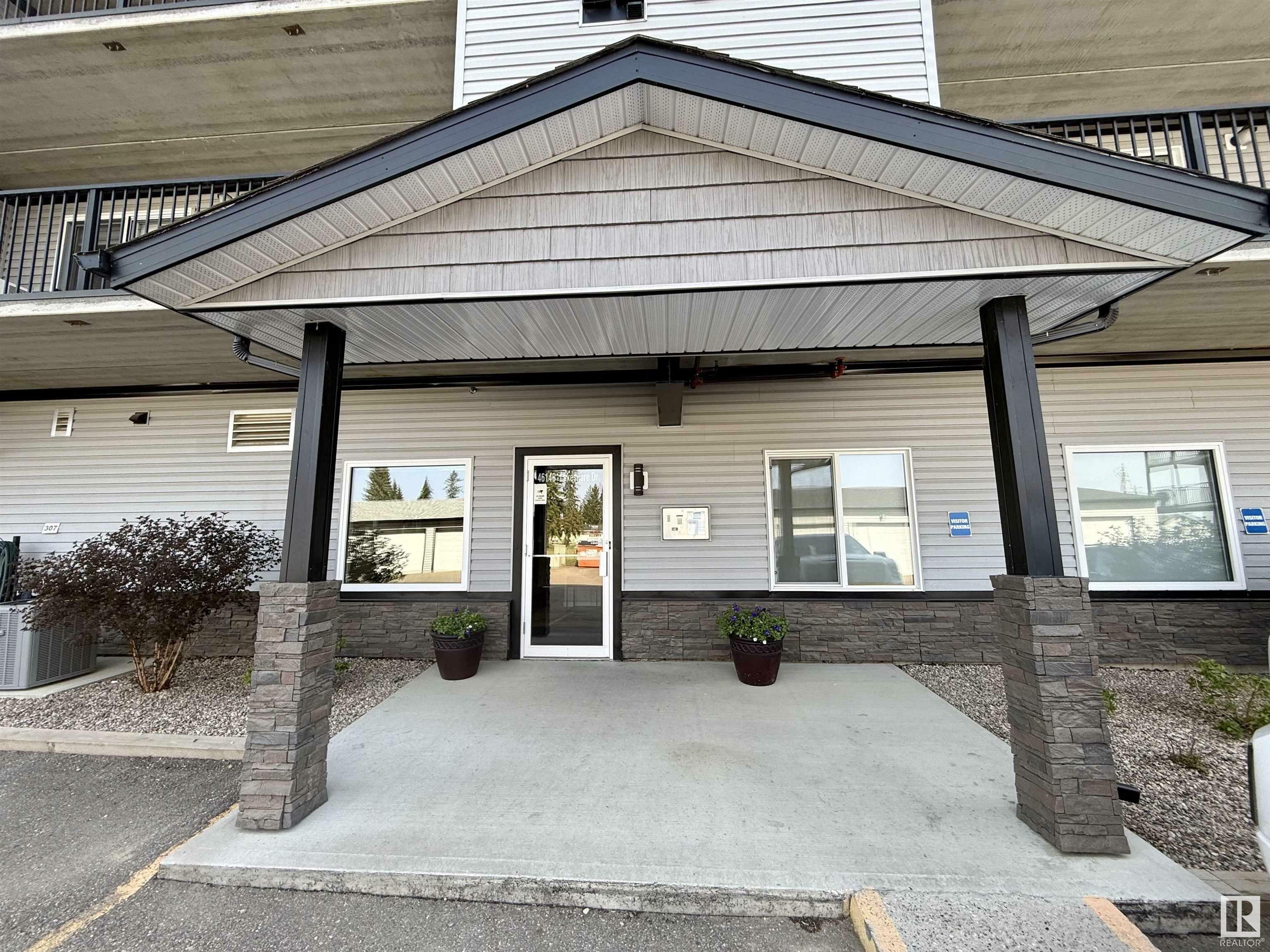 Property Photo: 4614B Lakeshore Drive 201 AB T0A 3A3