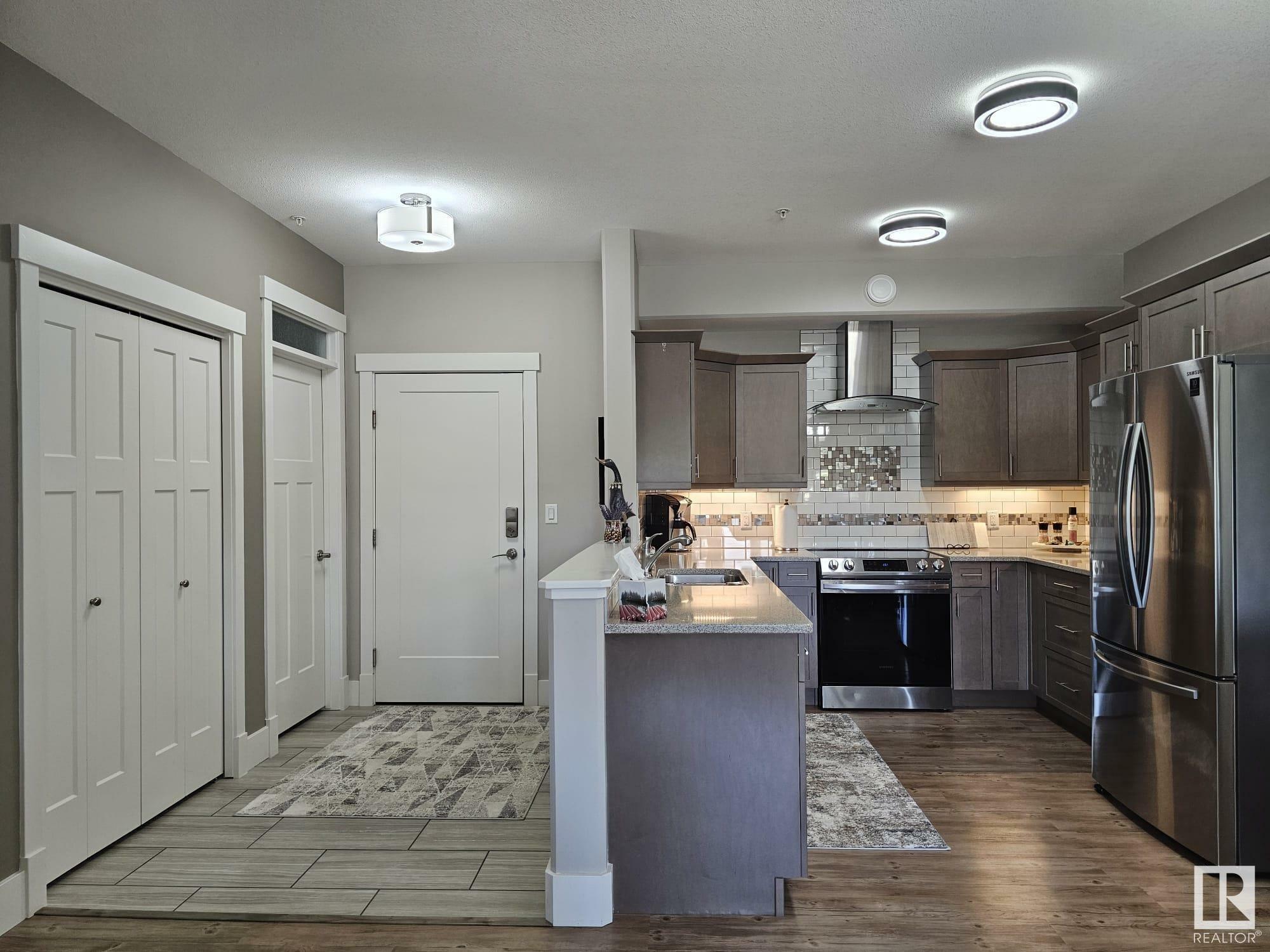 Property Photo:  5201 Brougham Drive 204  AB T7A 0C8 
