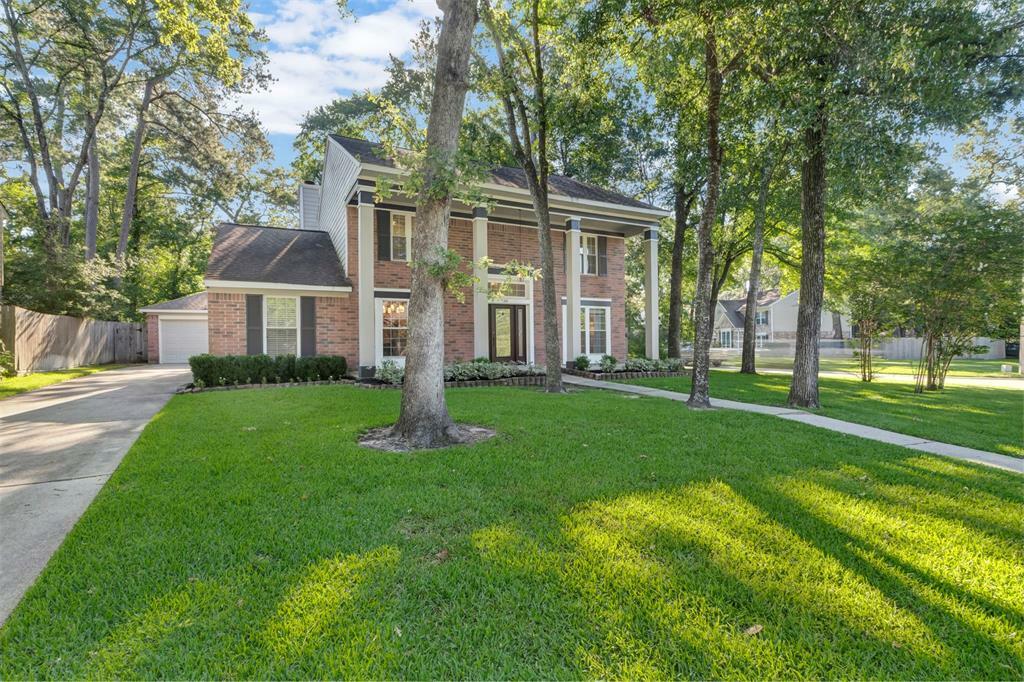 Property Photo: 38 Fire Flicker Place TX 77381