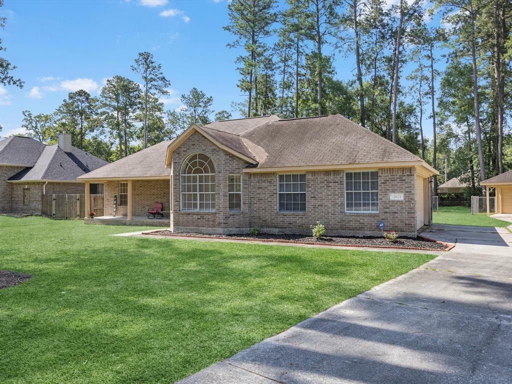 Property Photo: 2623 S Colosseum Court TX 77357