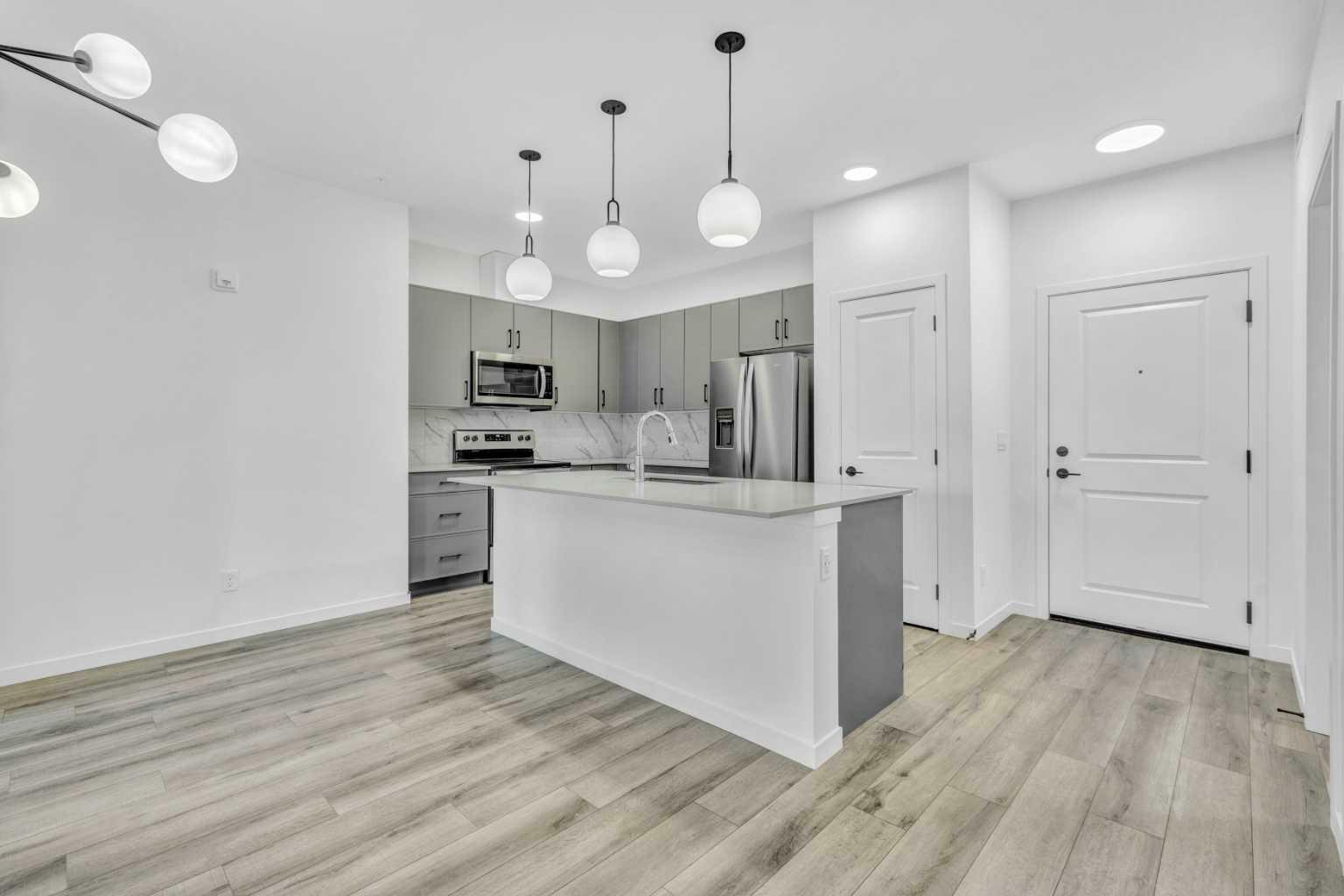 Property Photo: 140 Mahogany Street SE 113 AB T3M 3H4