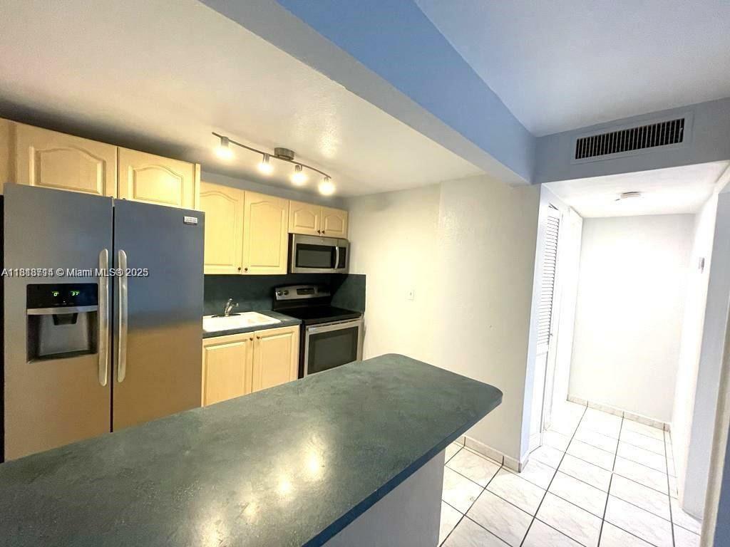 Property Photo: 4275 NW South Tamiami Canal Dr 2-108 FL 33126