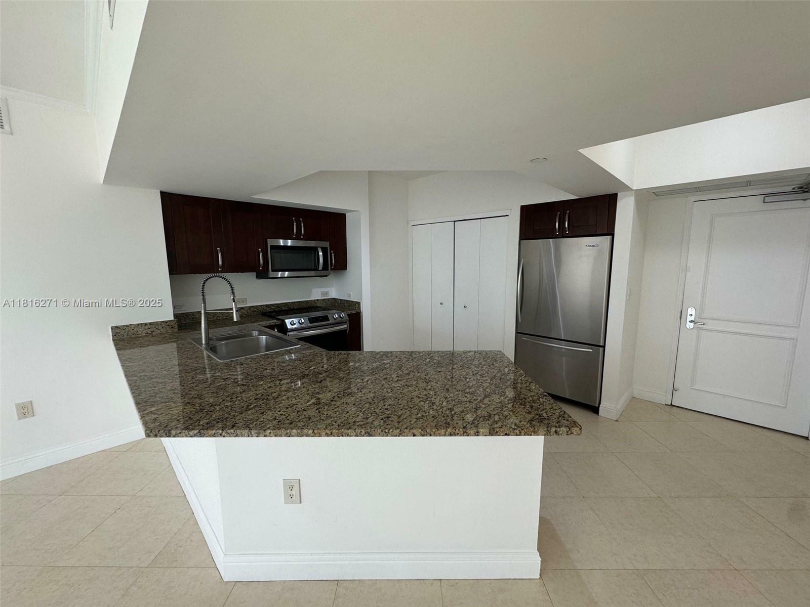 Property Photo:  19900 E Country Club Dr 209  FL 33180 
