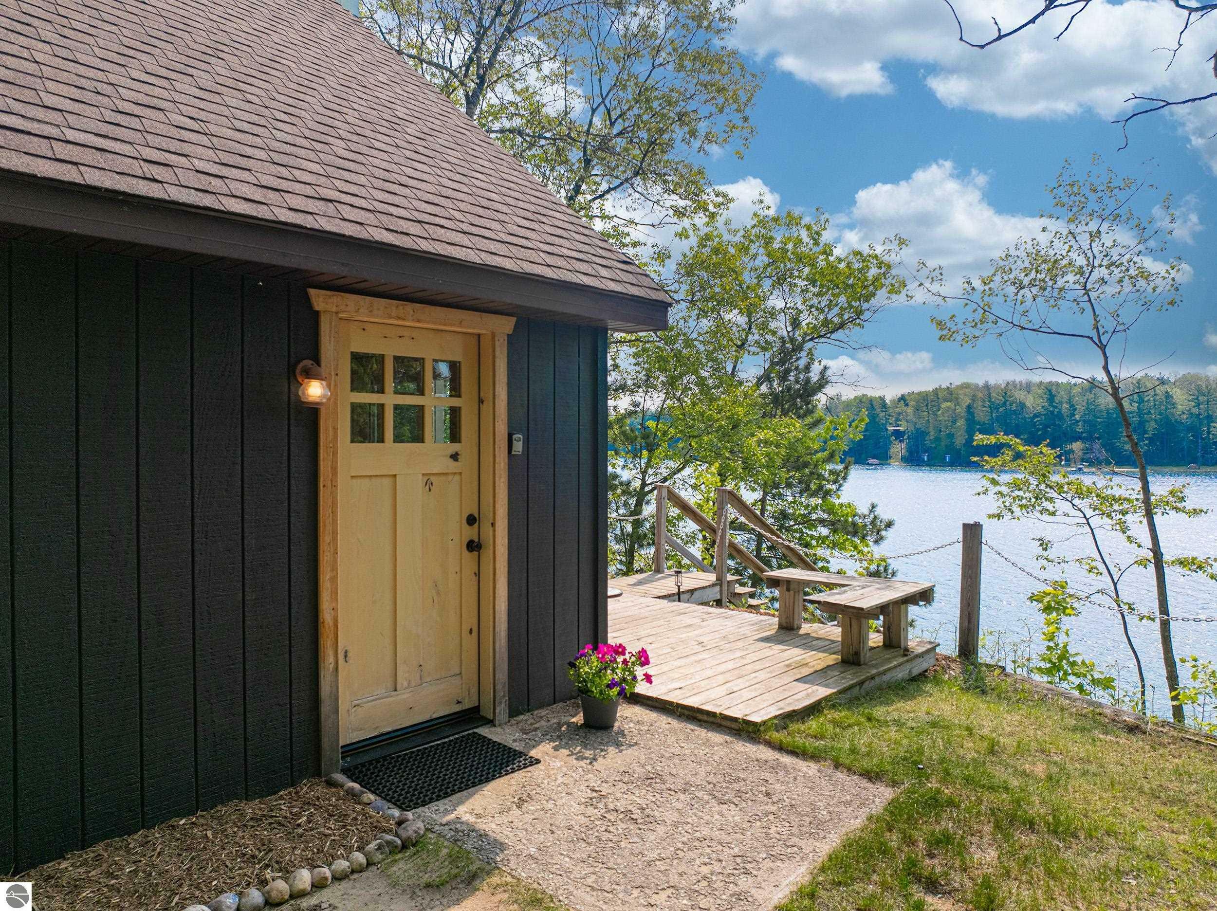 Property Photo:  10974 NE Bluff Drive  MI 49659 