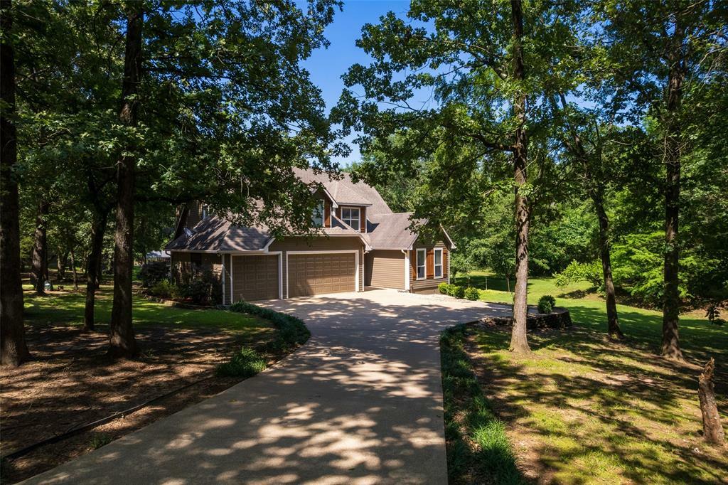 Property Photo: 233 E El Dorado Drive TX 75480