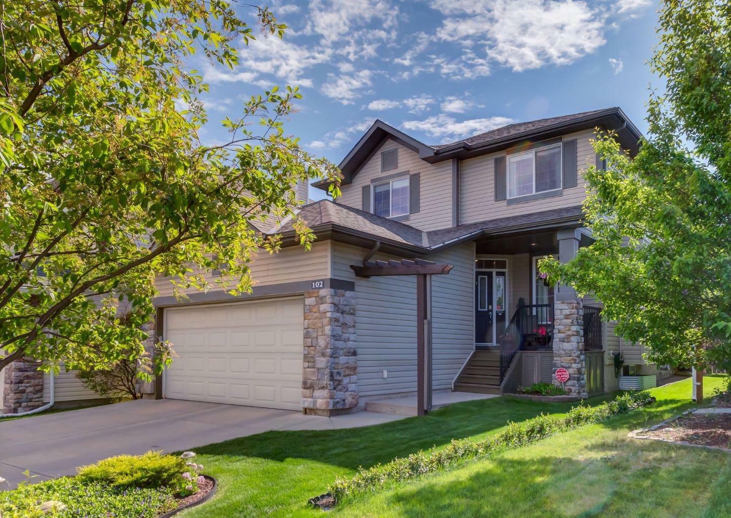 Property Photo: 102 Tuscany Ridge Heights NW AB T3L 3C1