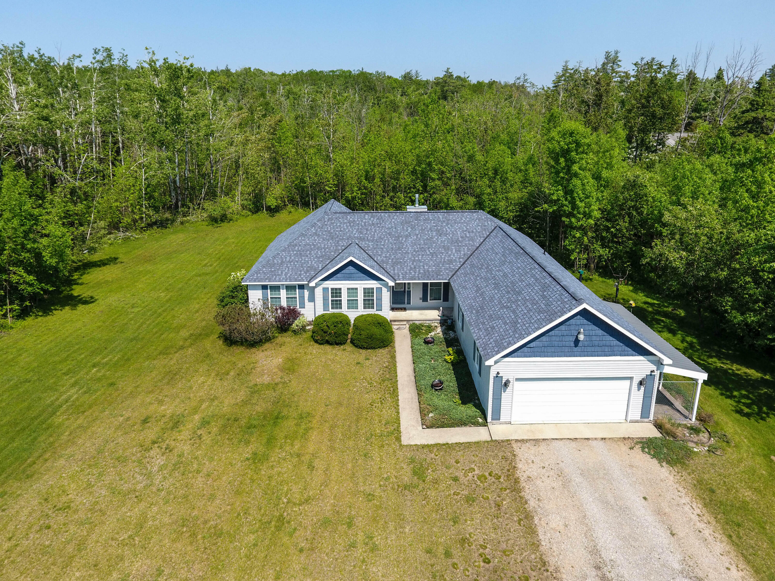 Property Photo: 1745 Mullett Lake Woods Road MI 49721