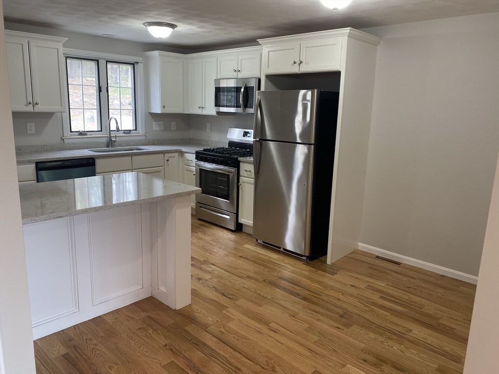 Property Photo: 104 Walpole 7 MA 02021