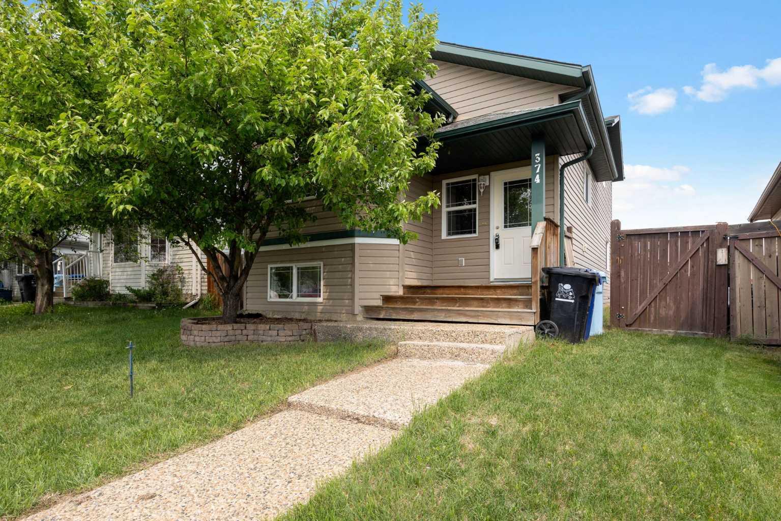 Property Photo: 374 Plamondon Drive AB T9K 0A7