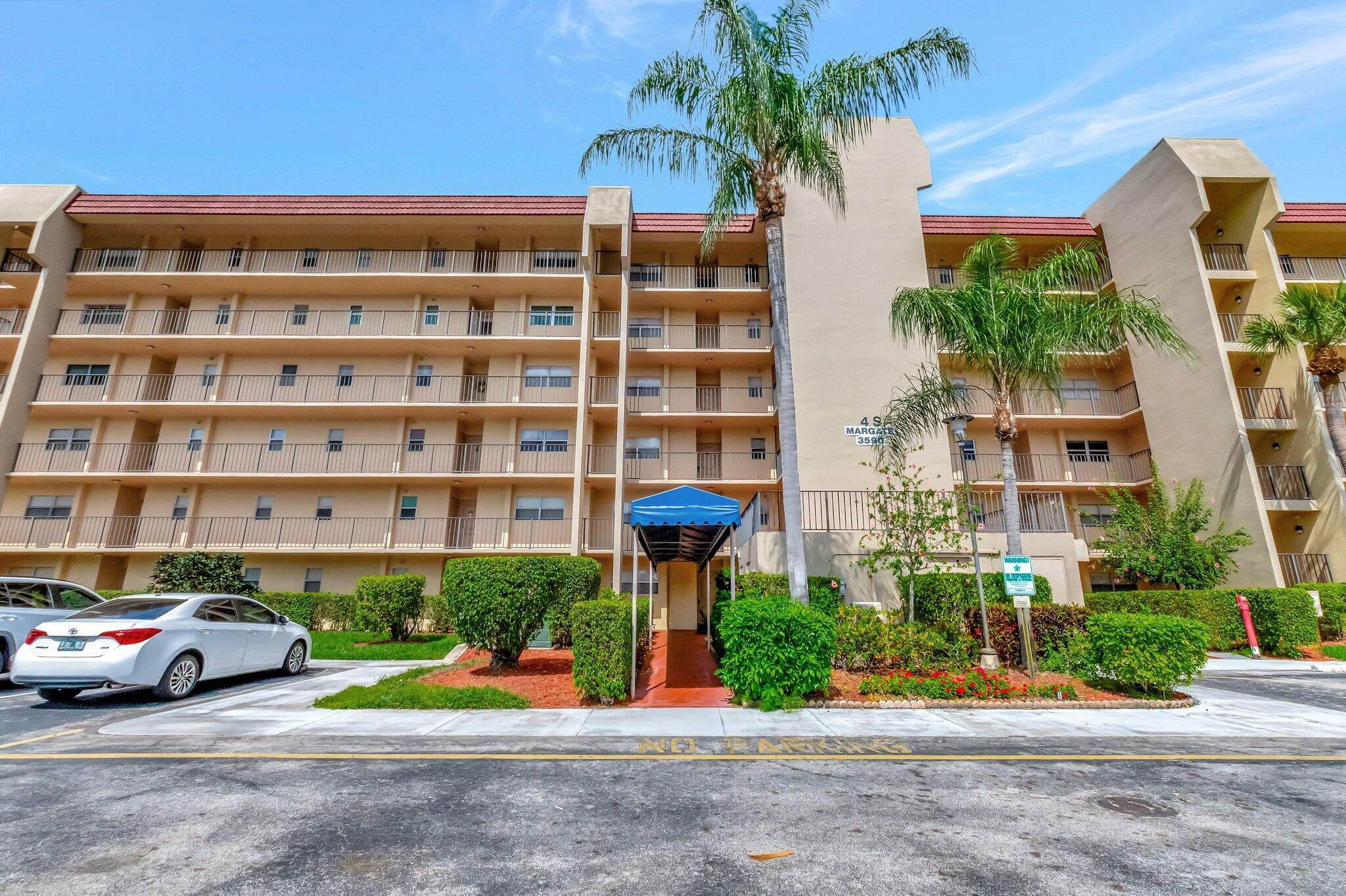 Property Photo: 3590 Via Poinciana 205 FL 33467