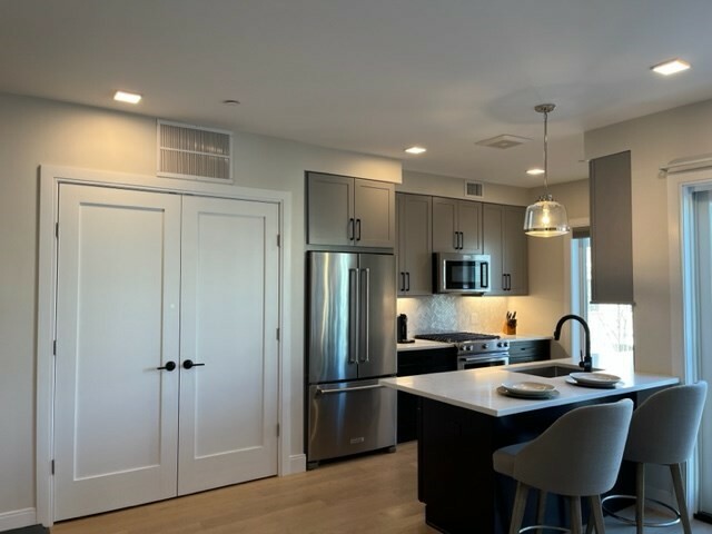 Property Photo: 287 Maverick St 202 MA 02128