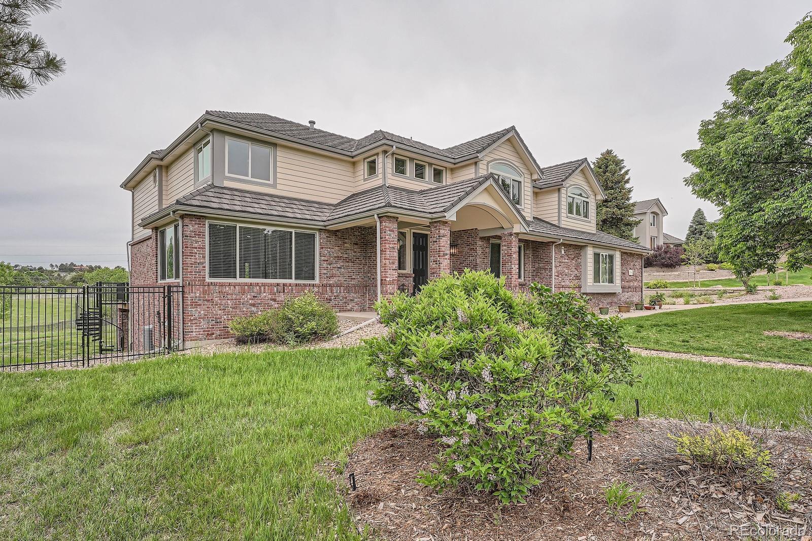 Property Photo: 7400 S Genoa Circle CO 80016