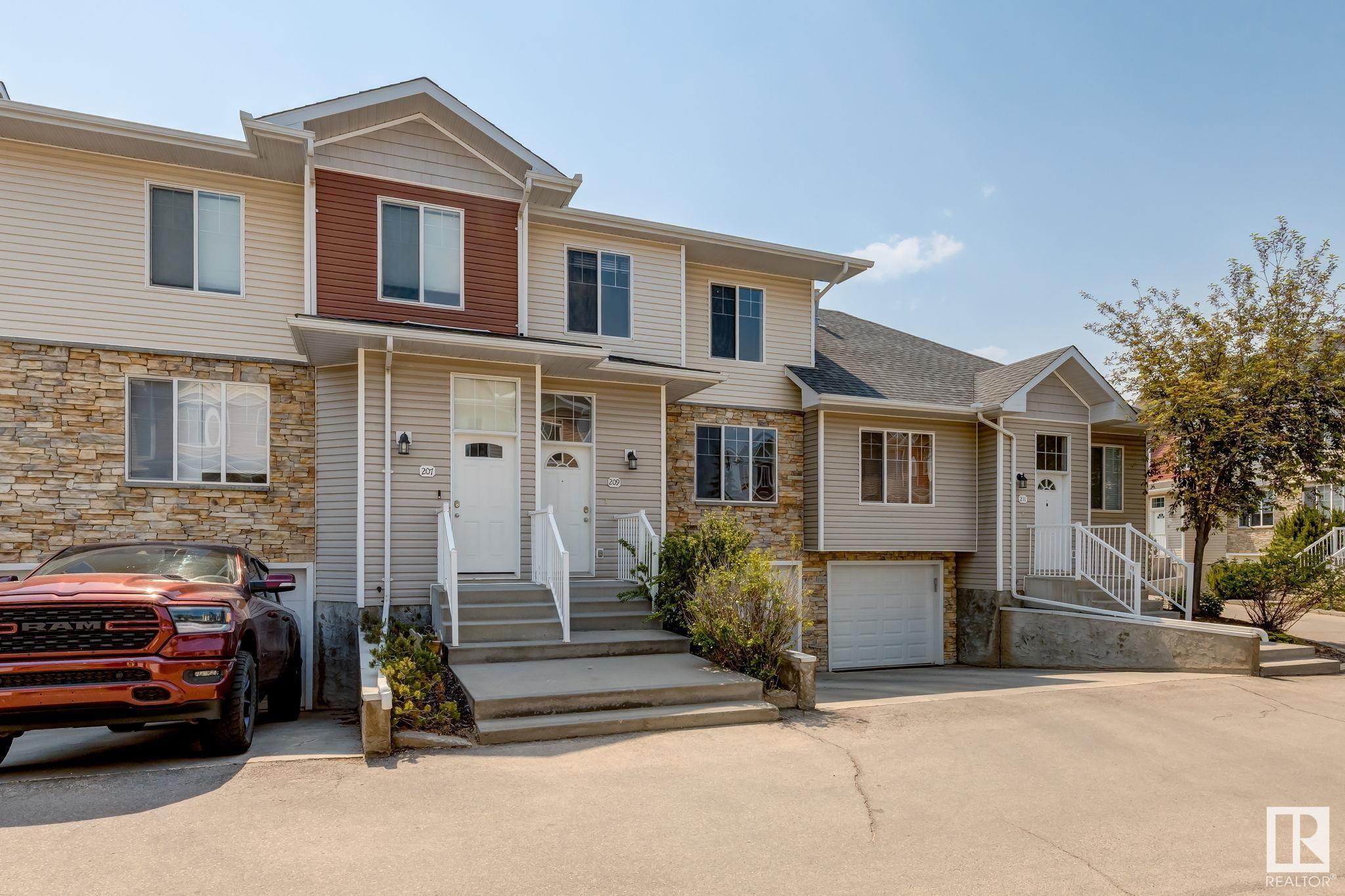 Property Photo: 178 Bridgeport Boulevard 209 AB T9E 8S8