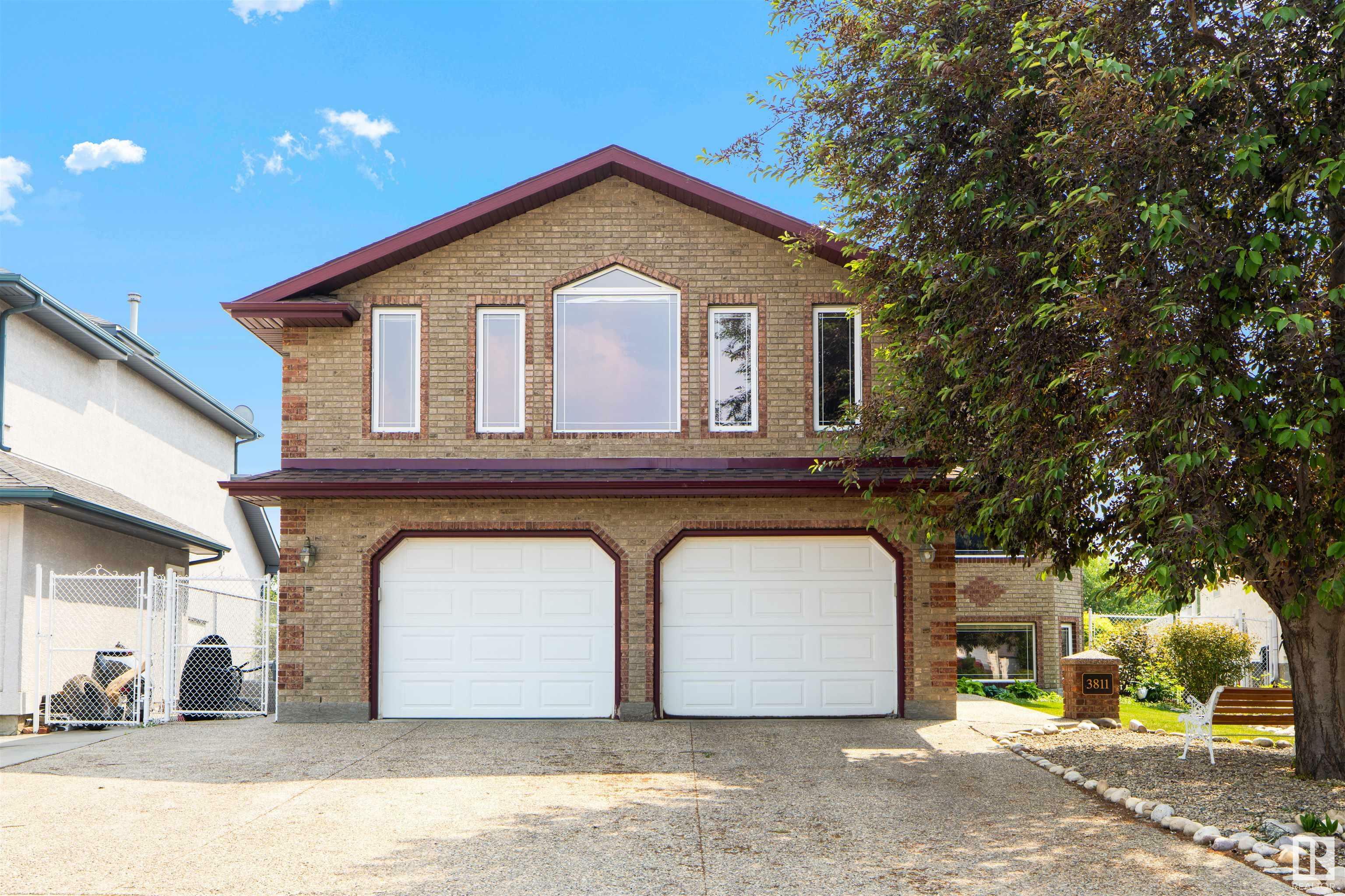 Property Photo:  3811 130 Avenue NW  AB T5A 5G1 