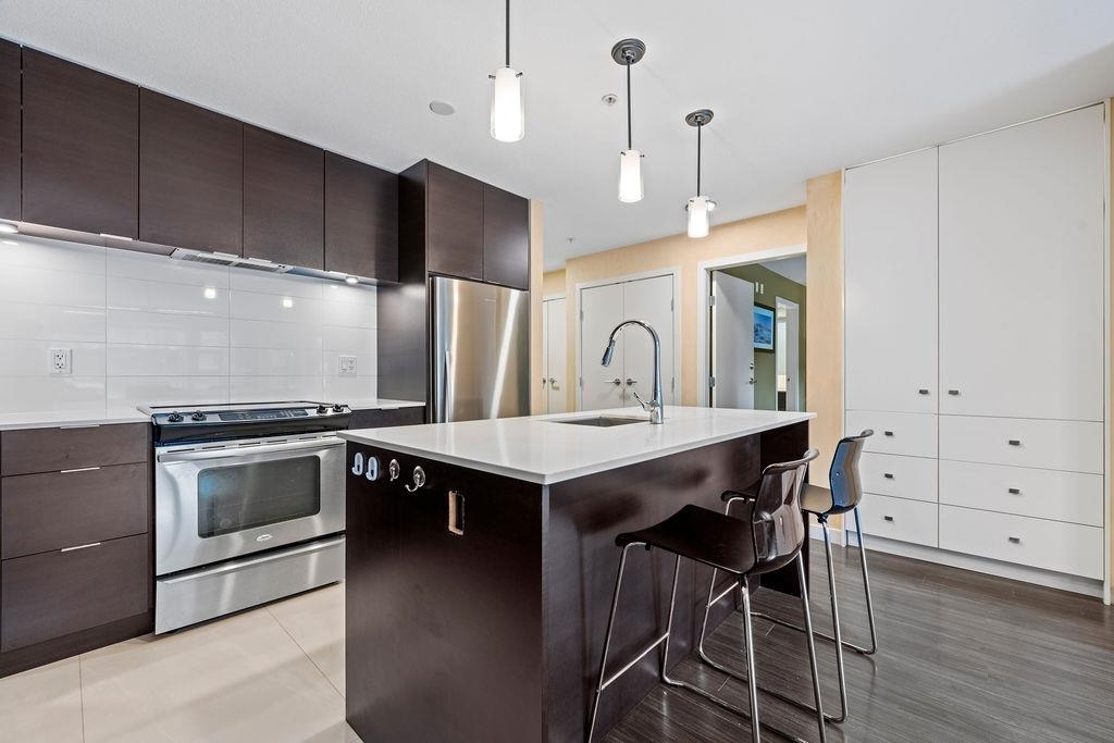 Property Photo: 1679 Lloyd Avenue 312 BC V7P 0A9