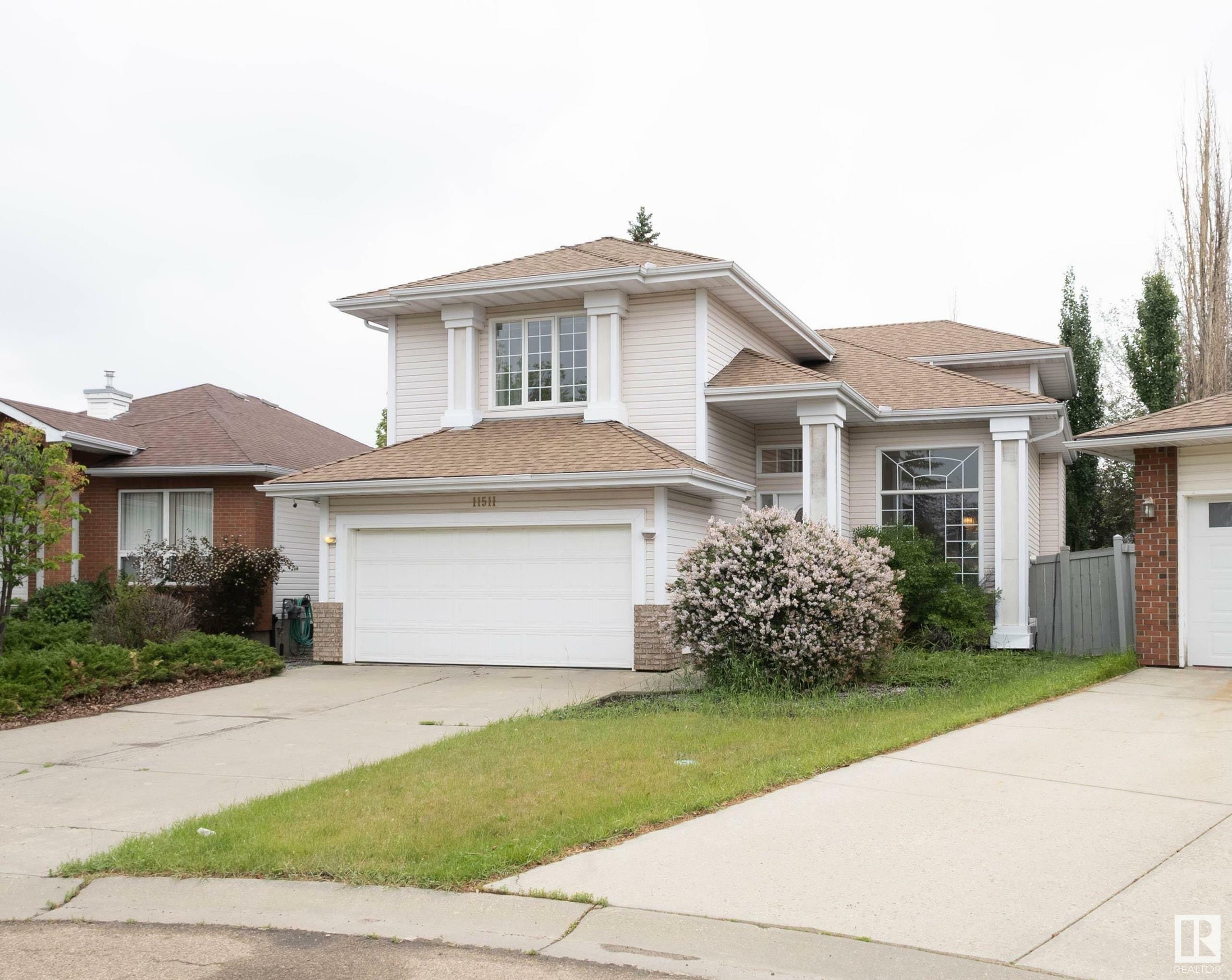 Property Photo: 11511 12 Avenue NW AB T6J 6X6