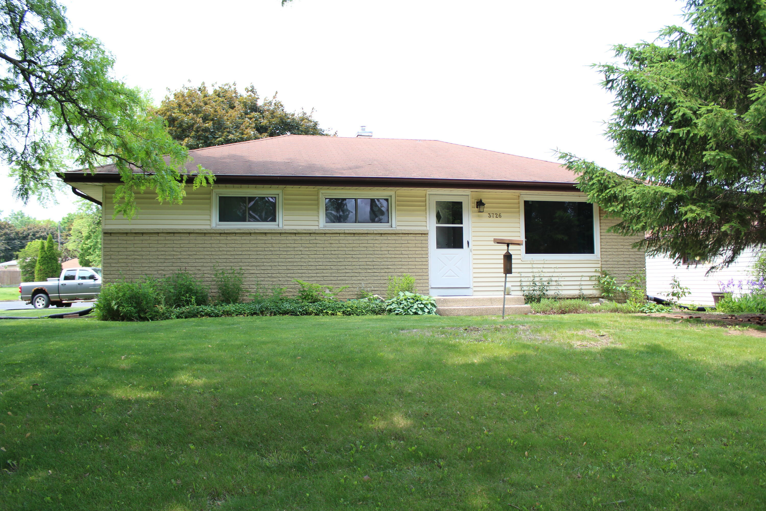 Property Photo: 3726 W Birchwood Ave WI 53221
