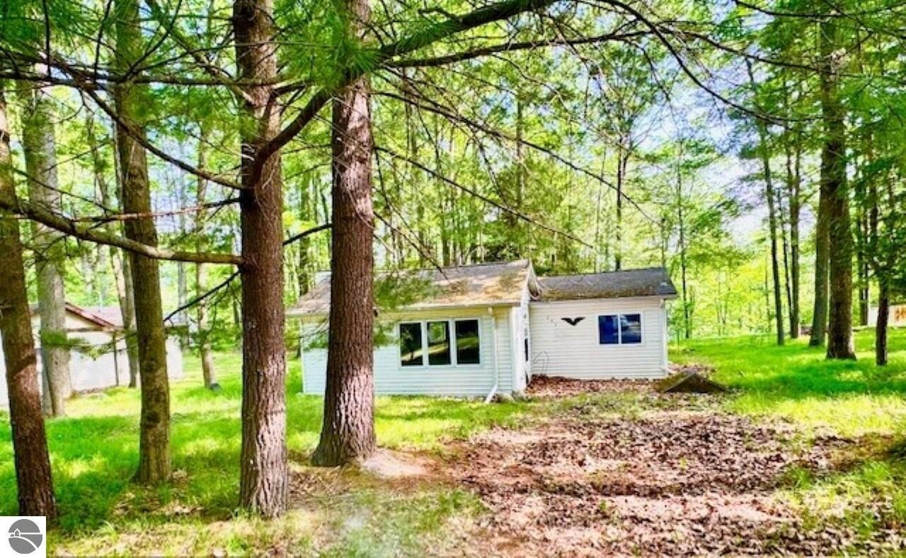 Property Photo:  751 Bungo Lake Road  MI 48625 
