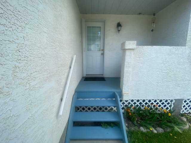 Property Photo: 465 Makenny Street 11 AB T7V 1H3