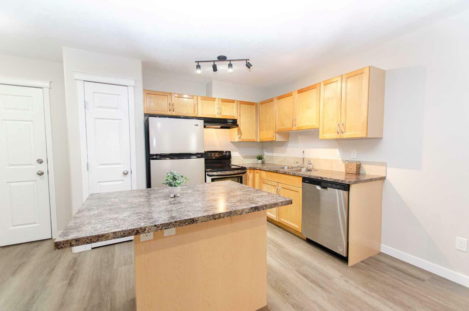 Property Photo: 5601 Kerrywood Drive 212 AB T4N 4X3