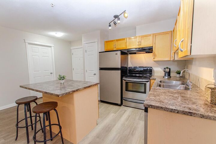 Property Photo: 5601 Kerrywood Drive 212 AB T4N 4X3