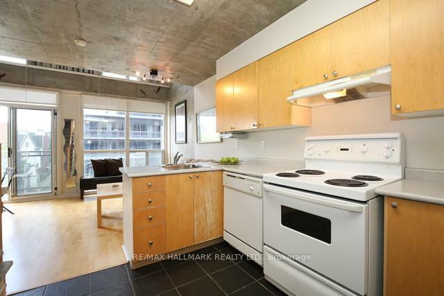 Property Photo: 1029 King Street W 409 ON M6K 3M2
